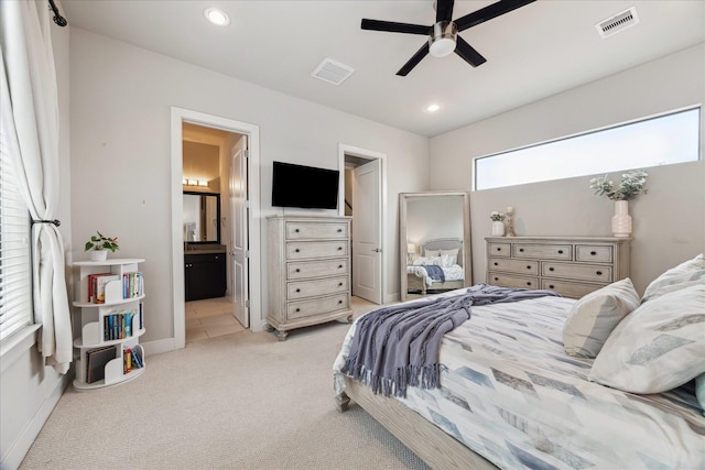 bedroom featuring recessed lighting, visible vents, and light colored carpet