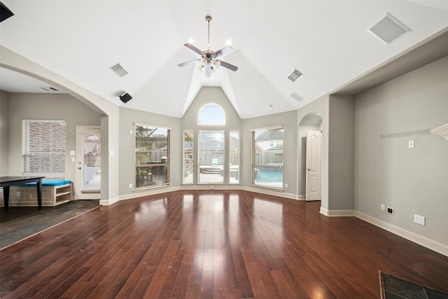 unfurnished living room with dark wood-style floors, visible vents, ceiling fan, and baseboards