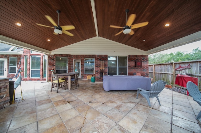 view of patio / terrace with a ceiling fan, outdoor dining area, fence, and grilling area