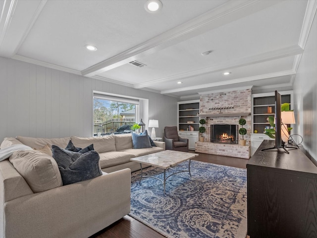 living room featuring a fireplace, beam ceiling, dark wood-style floors, and visible vents