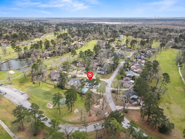 birds eye view of property featuring a residential view and a water view