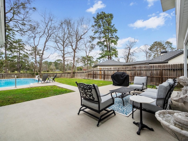 view of patio / terrace featuring an outdoor hangout area, a fenced in pool, a fenced backyard, and grilling area