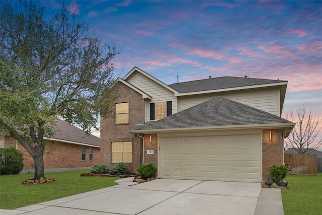 traditional home with brick siding, a shingled roof, concrete driveway, fence, and a garage