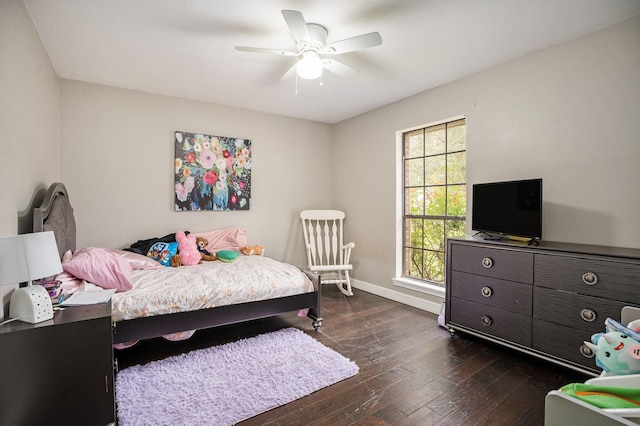 bedroom with dark wood finished floors, baseboards, and ceiling fan