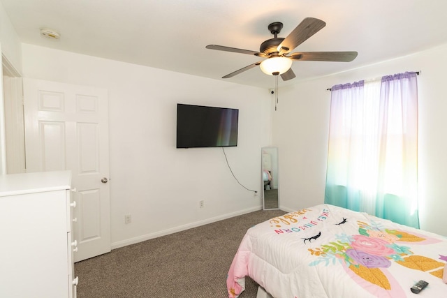 carpeted bedroom with baseboards and ceiling fan