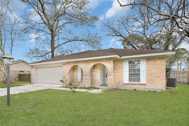 view of front of property with an attached garage, brick siding, a shingled roof, driveway, and a front lawn