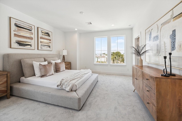 bedroom with light carpet, baseboards, visible vents, and recessed lighting