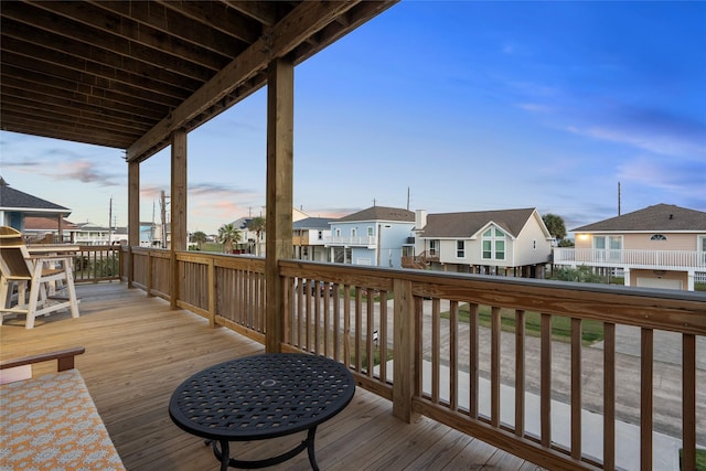 wooden deck with a residential view