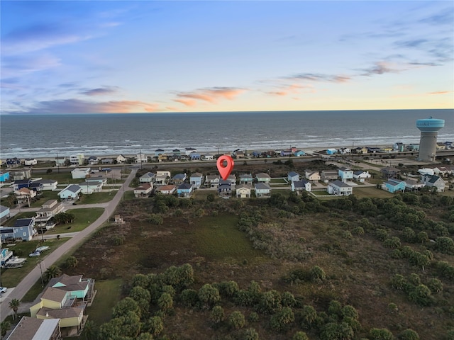 22318 Vista Del Mar, Galveston, TX 77554 - aerial view at dusk featuring a water view and a residential view