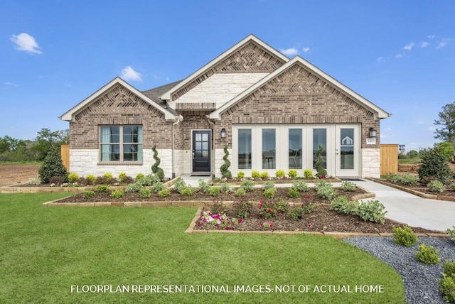 view of front of property with stone siding, brick siding, and a front lawn