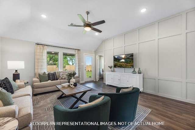 living room with lofted ceiling, recessed lighting, a decorative wall, dark wood-style flooring, and a ceiling fan