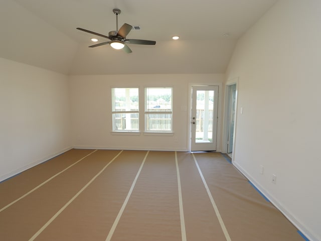 22431 Birchfield Grove Ln, New Caney, TX 77357 - spare room with lofted ceiling, a ceiling fan, and baseboards