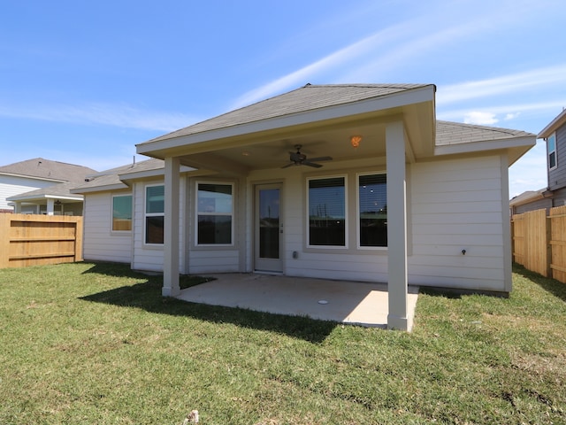 22431 Birchfield Grove Ln, New Caney, TX 77357 - back of house featuring a ceiling fan, a patio area, and a shingled roof