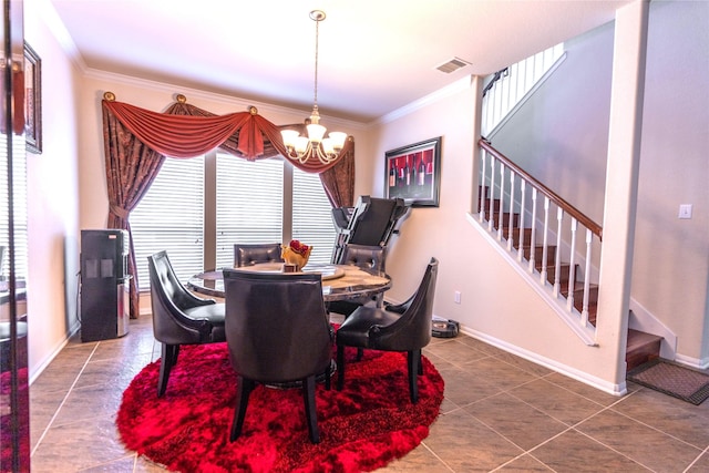 tiled dining room with stairs, baseboards, visible vents, and crown molding