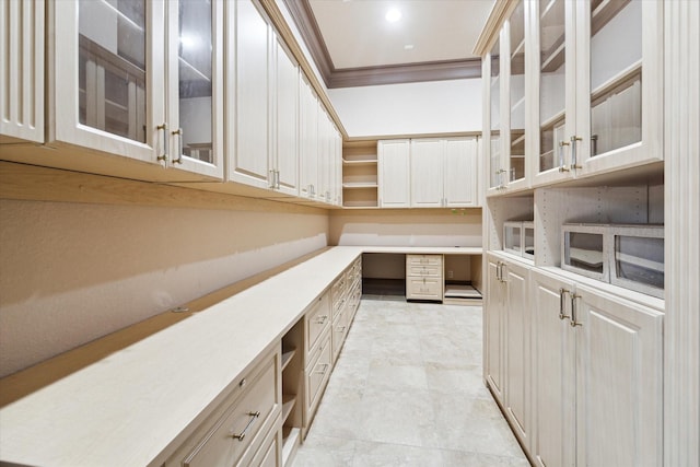 home office featuring crown molding