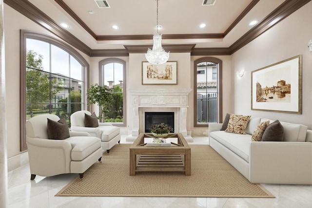 living area with a high end fireplace, visible vents, and crown molding