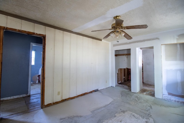 2420 Harriot St, Beaumont, TX 77705 - unfurnished bedroom featuring a textured ceiling, a ceiling fan, and crown molding