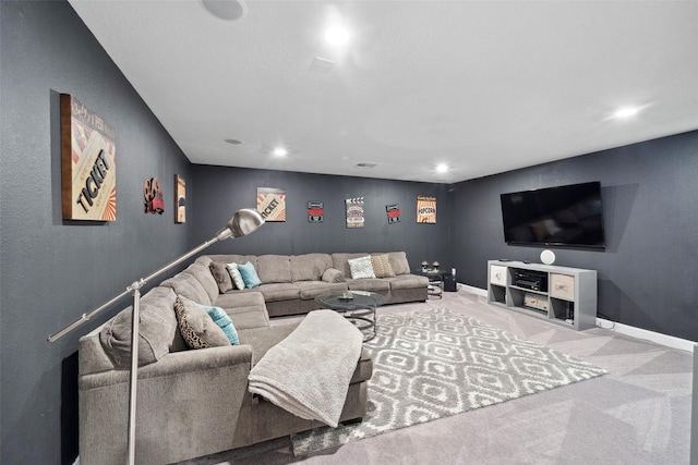 living area featuring recessed lighting, baseboards, and light colored carpet