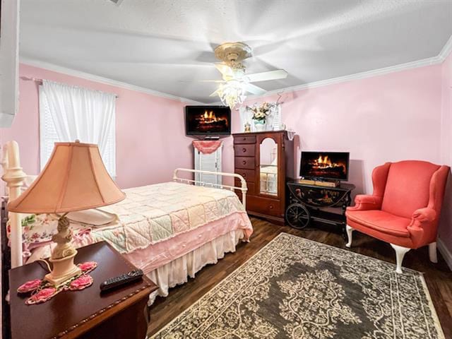 bedroom featuring dark wood finished floors and crown molding