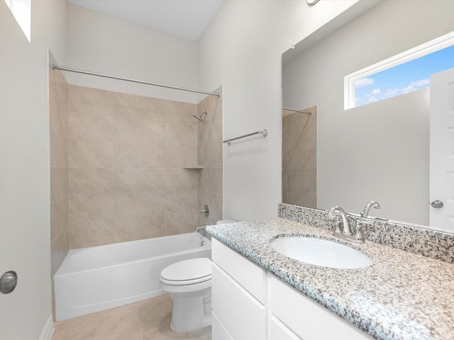 full bathroom with tile patterned flooring, tub / shower combination, vanity, and toilet