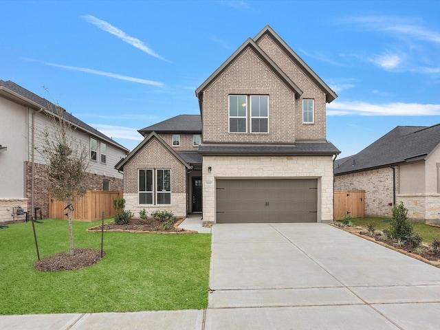 view of front of home with fence, a front lawn, concrete driveway, and brick siding