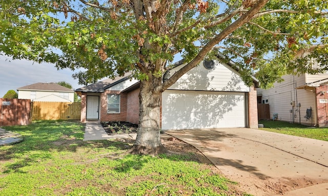 ranch-style house featuring brick siding, fence, a garage, driveway, and a front lawn