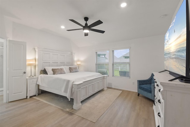 bedroom with lofted ceiling, light wood-style floors, a ceiling fan, and recessed lighting