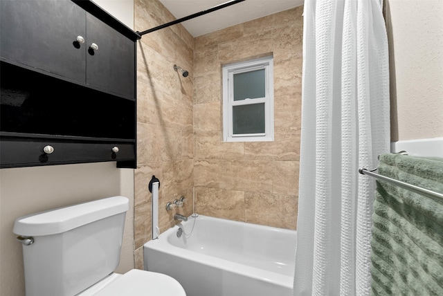 full bathroom with shower / tub combo and toilet