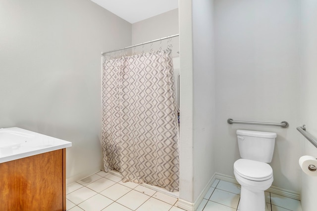 bathroom featuring tile patterned flooring, a shower with shower curtain, toilet, and vanity
