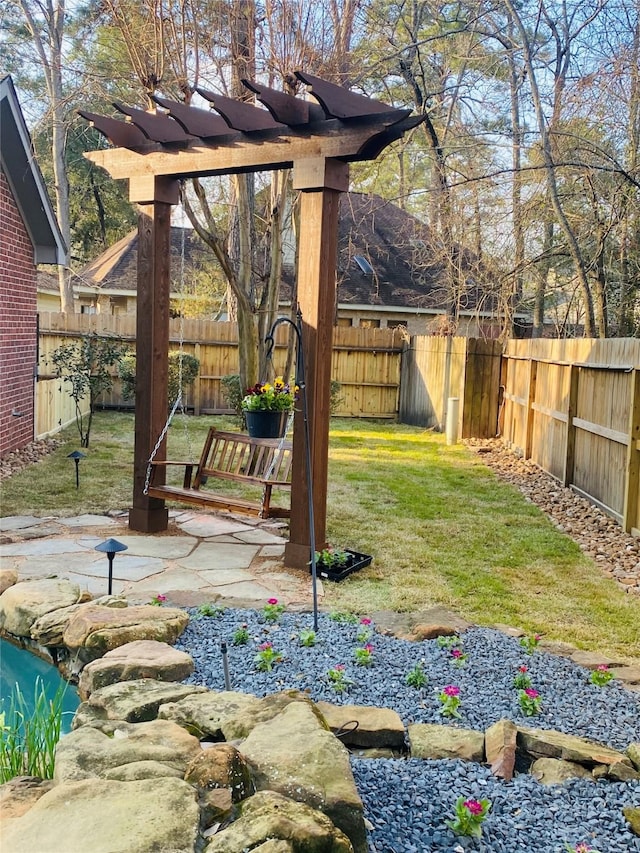 view of yard with a fenced backyard and a patio