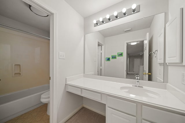 full bathroom featuring visible vents, toilet, tile patterned floors, vanity, and washtub / shower combination