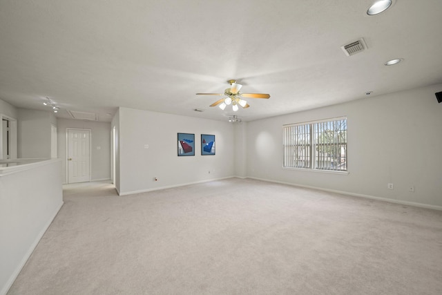 16942 Laguna Springs Dr, Houston, TX 77095 - empty room featuring attic access, light carpet, a ceiling fan, baseboards, and recessed lighting