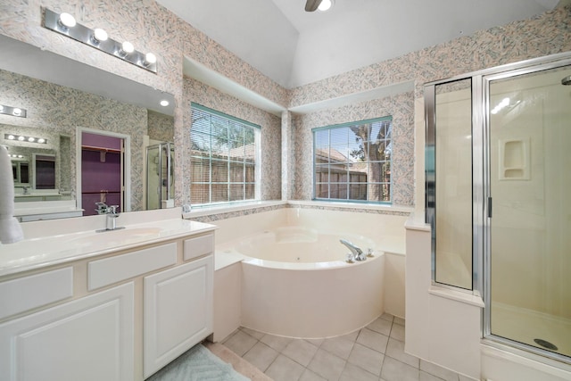 16942 Laguna Springs Dr, Houston, TX 77095 - full bath with tile patterned flooring, a stall shower, a jetted tub, vanity, and vaulted ceiling
