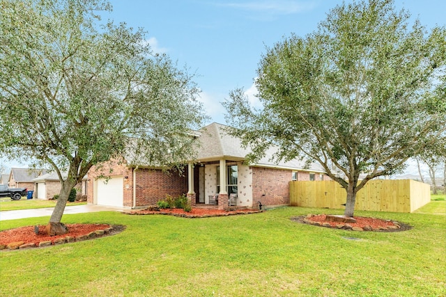 single story home featuring driveway, brick siding, an attached garage, fence, and a front yard