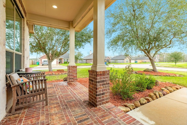 view of patio featuring a residential view and covered porch