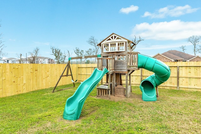 view of jungle gym featuring a fenced backyard and a yard