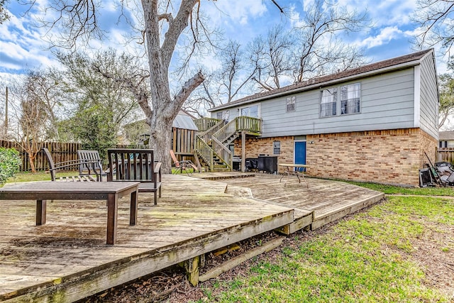 wooden deck with fence and stairs