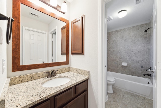 bathroom with toilet, visible vents,  shower combination, and vanity