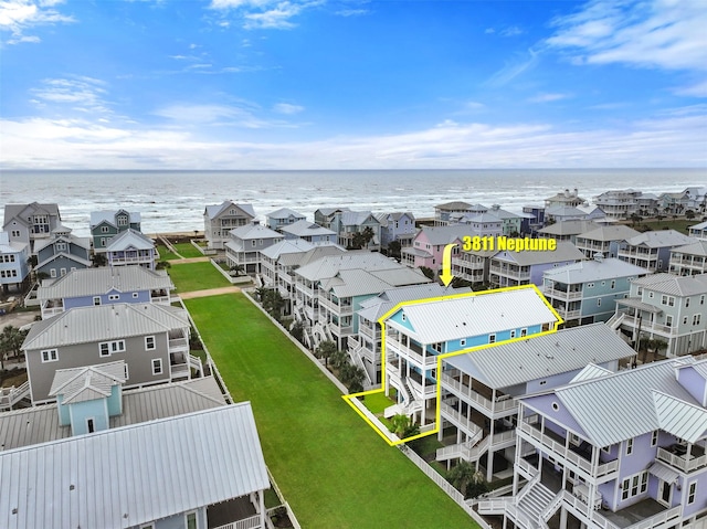 aerial view with a water view and a residential view