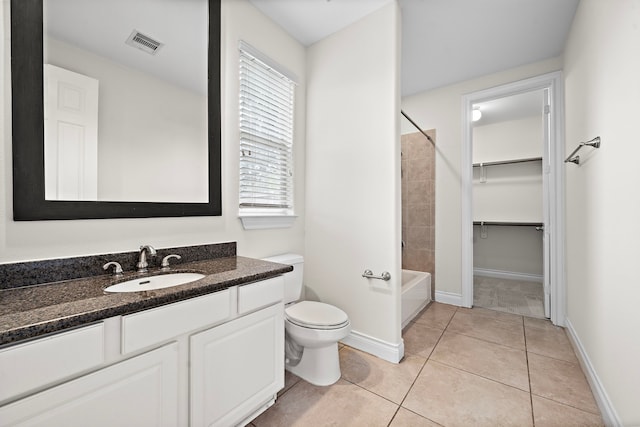 bathroom with visible vents, baseboards, toilet, tile patterned floors, and vanity