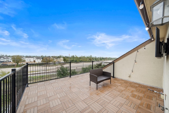 view of patio with a balcony