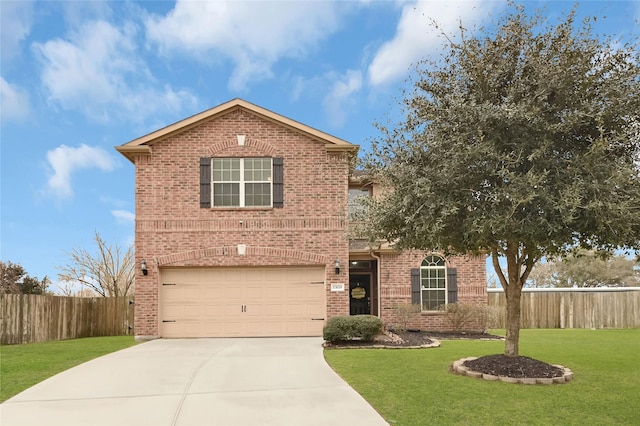 traditional-style house with an attached garage, brick siding, fence, concrete driveway, and a front lawn