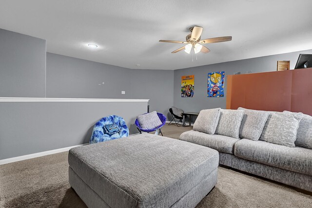 bedroom with a ceiling fan, carpet, and baseboards