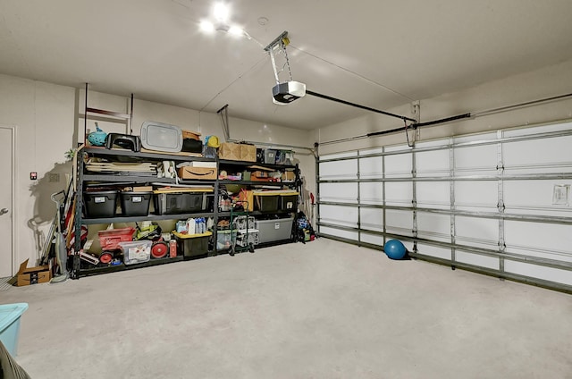 garage featuring a garage door opener