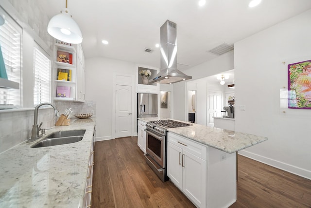 kitchen featuring island range hood, stainless steel appliances, a sink, white cabinets, and a center island