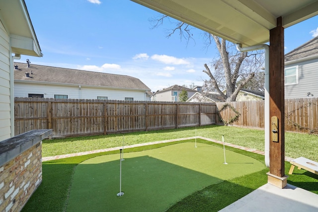 view of yard featuring a fenced backyard