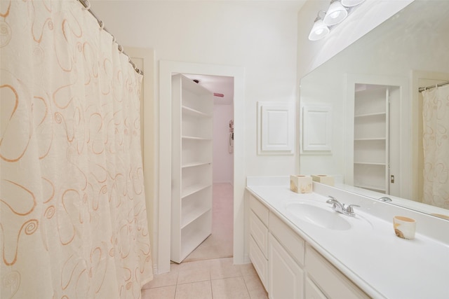 full bathroom with tile patterned flooring and vanity