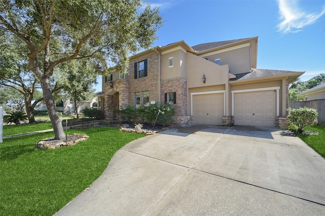 view of front of property with a garage, brick siding, driveway, stucco siding, and a front lawn