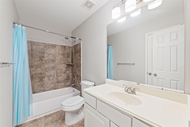 full bathroom featuring shower / tub combo with curtain, visible vents, toilet, vanity, and tile patterned flooring