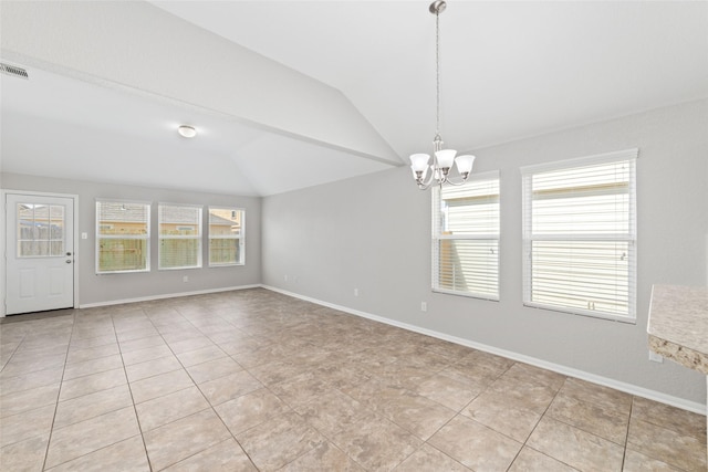 spare room with vaulted ceiling, baseboards, a chandelier, and a healthy amount of sunlight